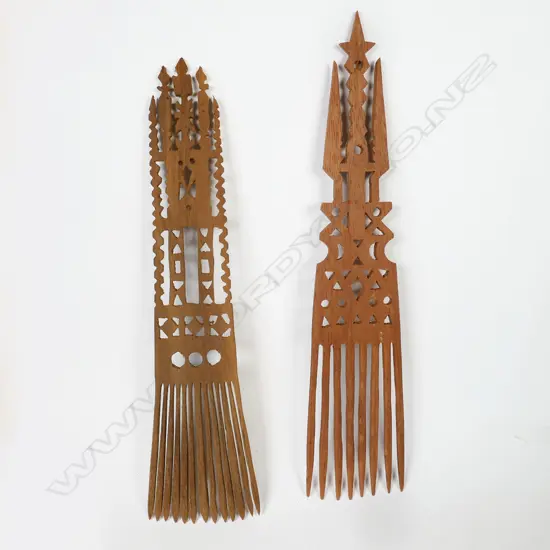 Two Samoan carved wood combs,